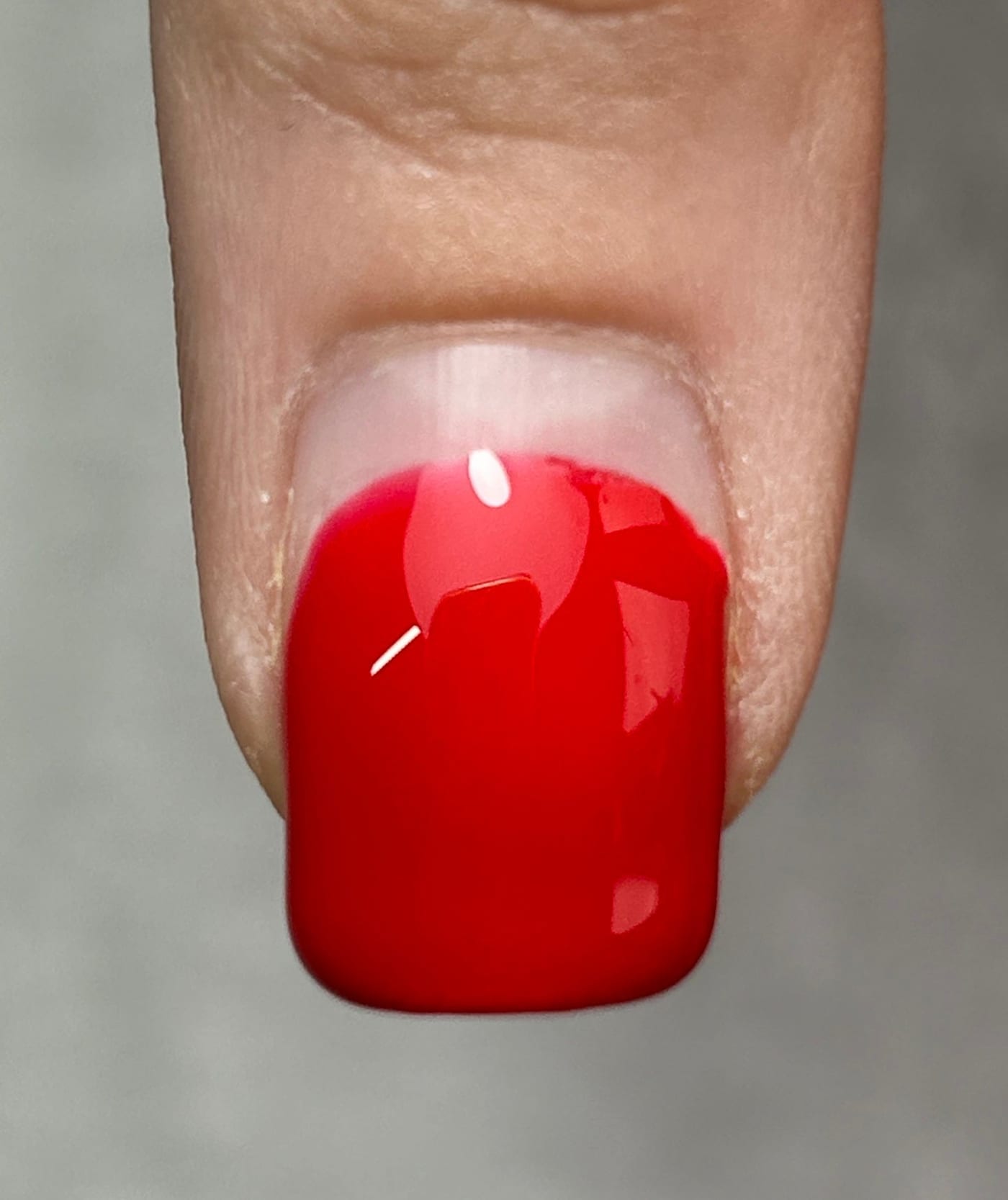 Close-up of glossy gel polish on a fingernail Close-up of glossy gel polish on a fingernail