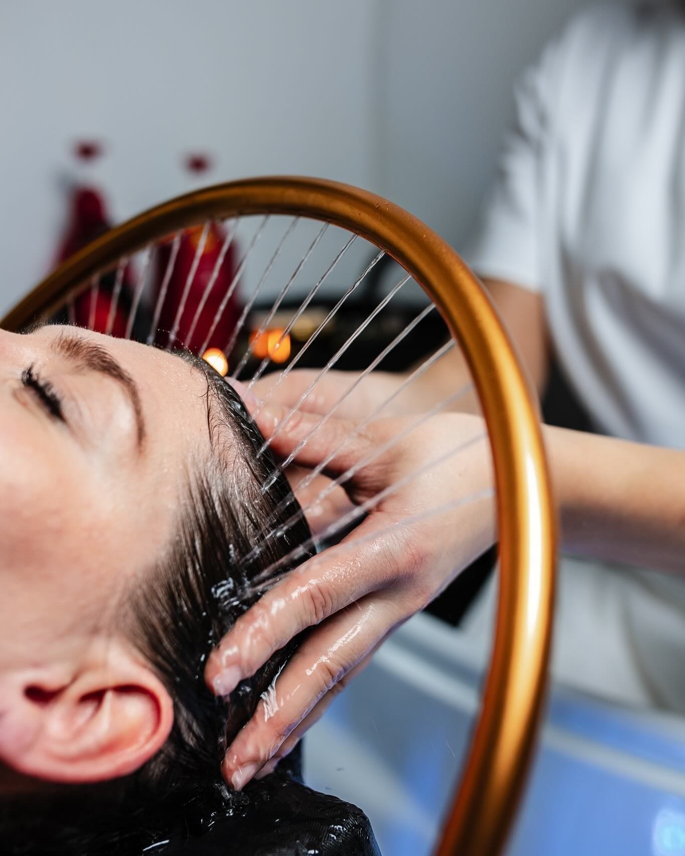 Relaxing professional hair spa treatment at a salon wash station
