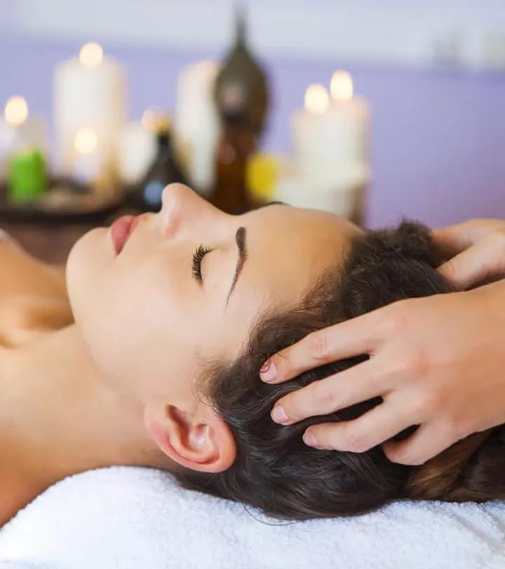 Client receiving a relaxing scalp and head massage at a salon