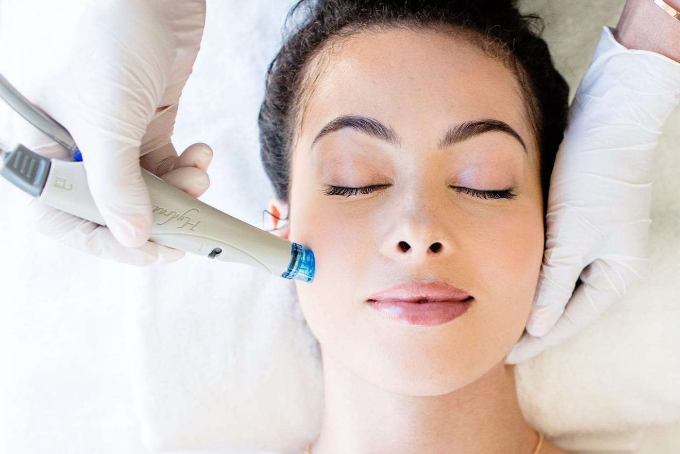 Hydra-peel facial device treatment on a client's skin Hydra-peel facial device treatment on a client's skin