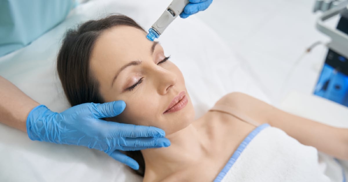 Client receiving an oxygen facial treatment Client receiving an oxygen facial treatment